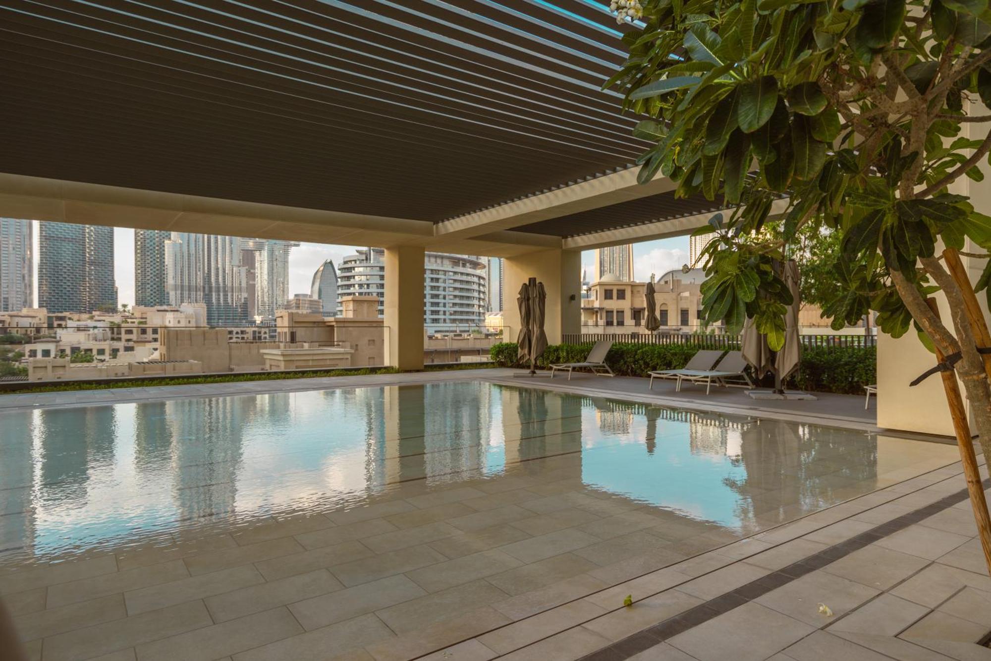 Appartamento Prime Retreats @ Burj Royale By Emaar Dubai Esterno foto